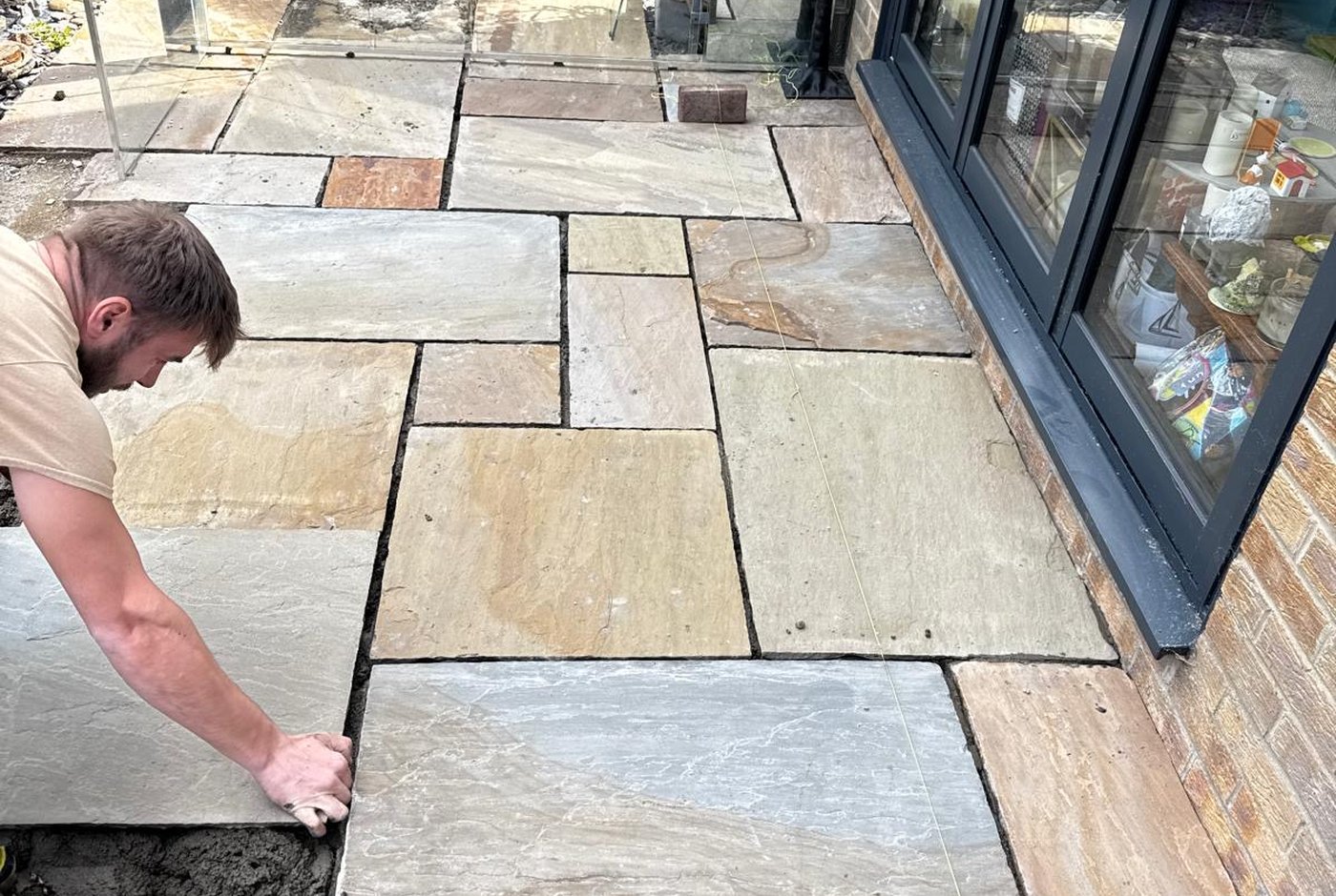 New slate edging being set in mortar