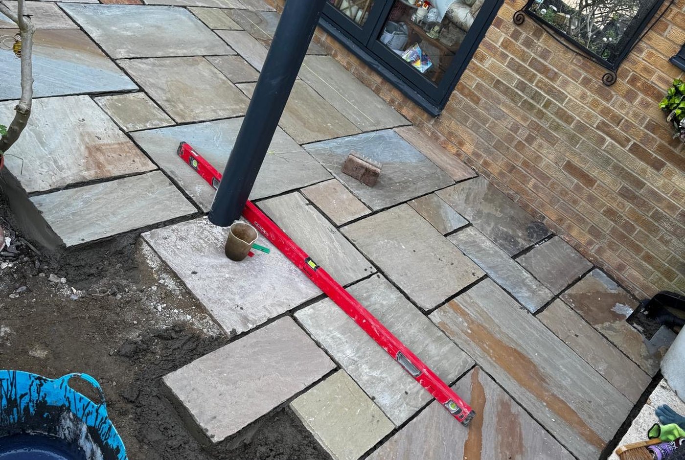 Edging detail and slabs re-laid