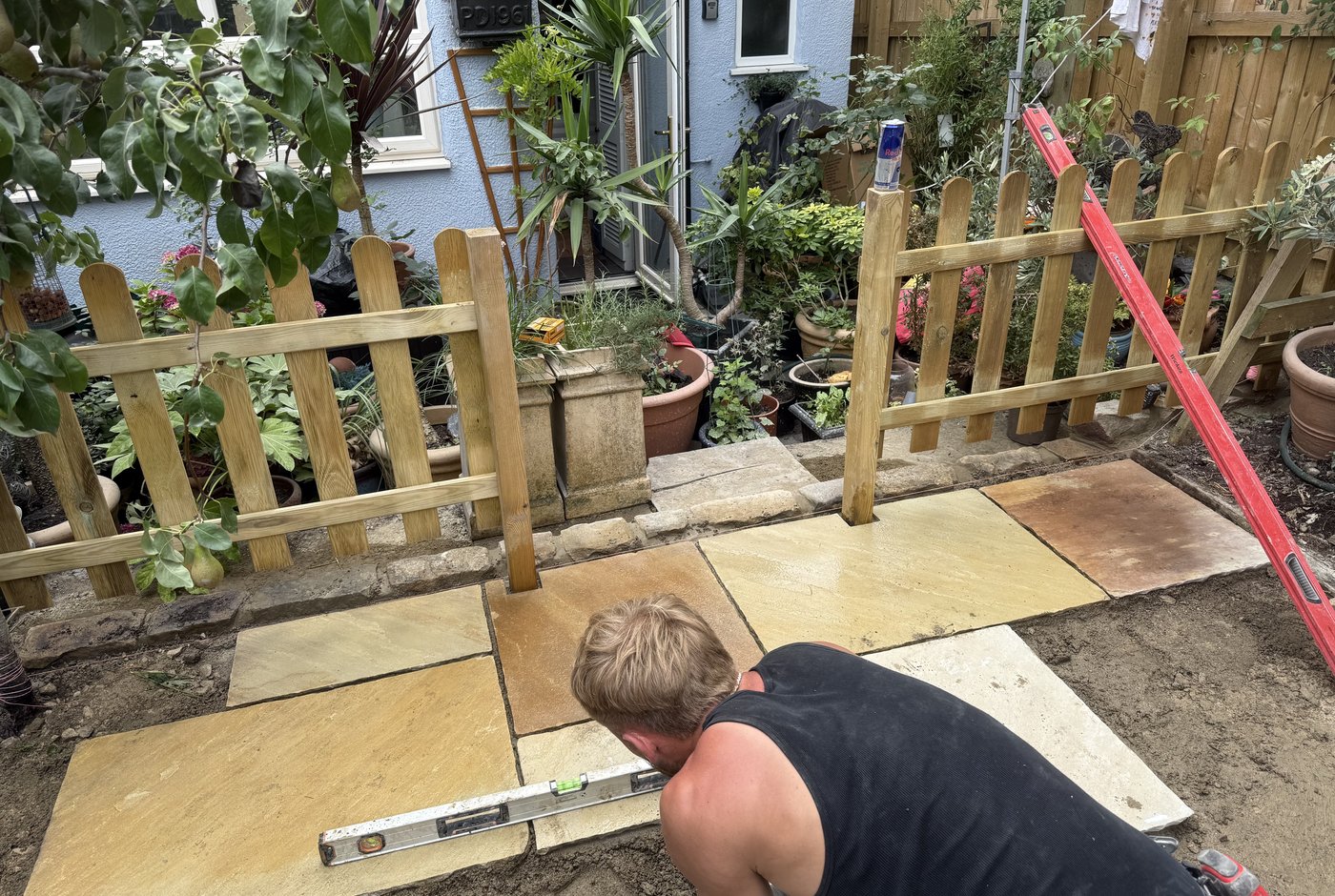 Semicircle planting bed cut into patio